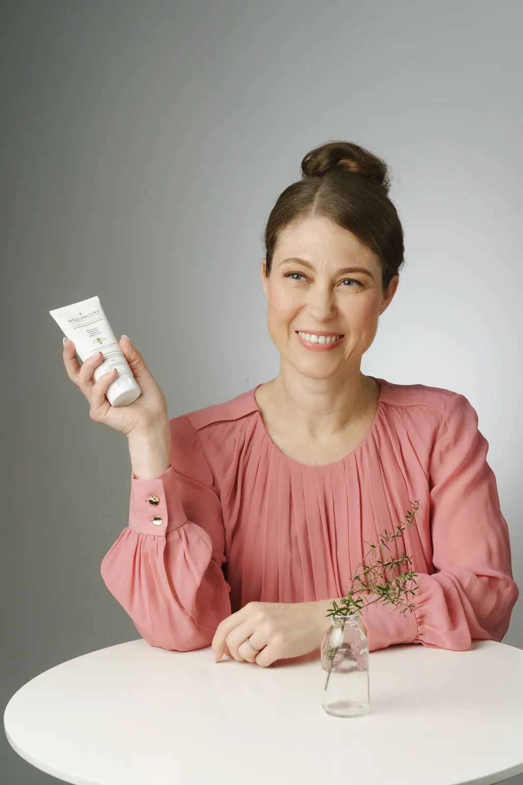 Wellswood founder holding Intensive Skin Therapy